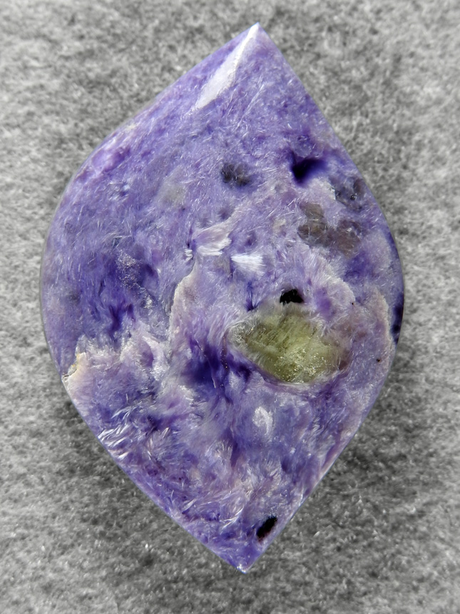 Charoite 554  :  I love the swirls and crsytals in Charoite and the color is killer.  A nice large cab of this great Russian material.