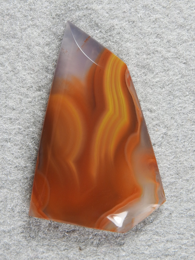 Apache flame agate 316  :  A nice cab for a pendant this cab features the classic colors of the Apache and has a dynamite pattern.