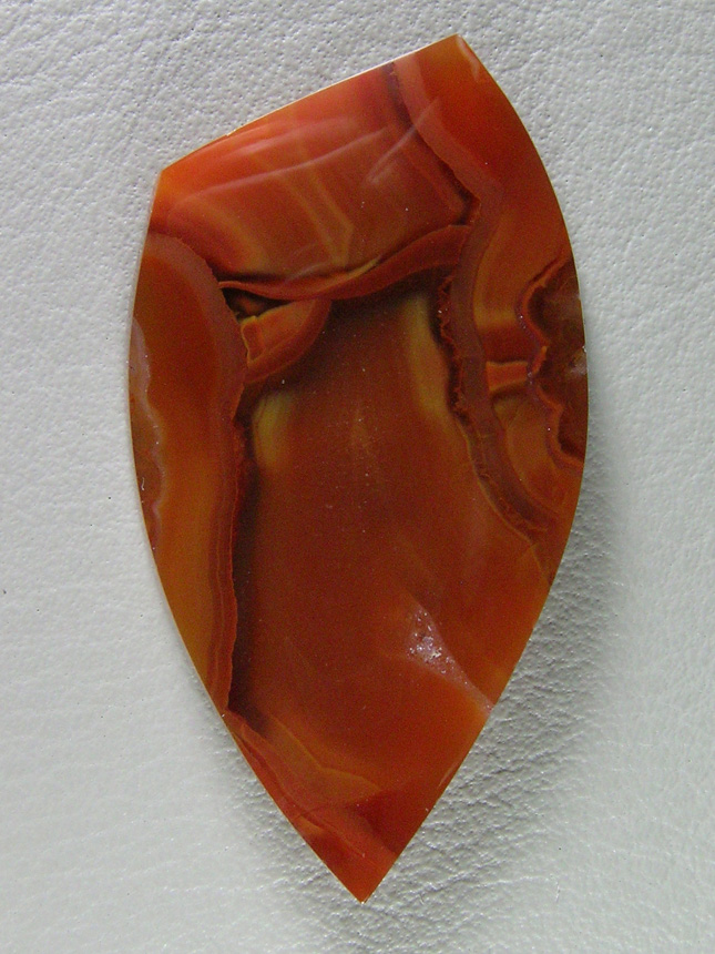 traded Apache Flame Agate 331T  :  An unusual piece of Apache with an almost solid Orange Red color.