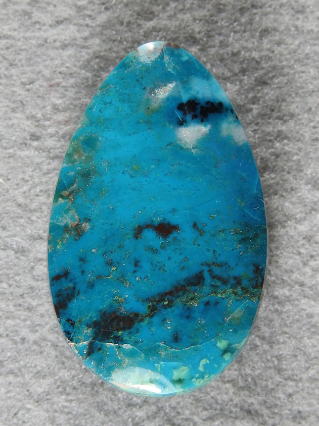 Chrysocolla 1956 : This is some top end material with Turquoise Blues in glassy material with a high polish.  Green hints add to this ones charm.