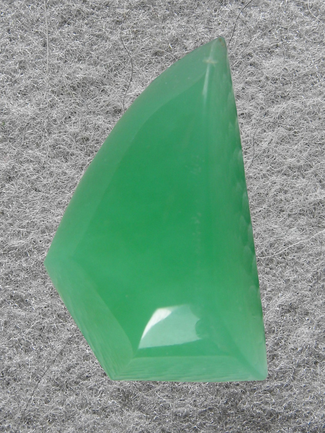 Chrysoprase 560  :  A gemmy cab of Chrysoprase.  Doesn;t get any cleaner than this.  A joy to cut, this material has a glow about it.