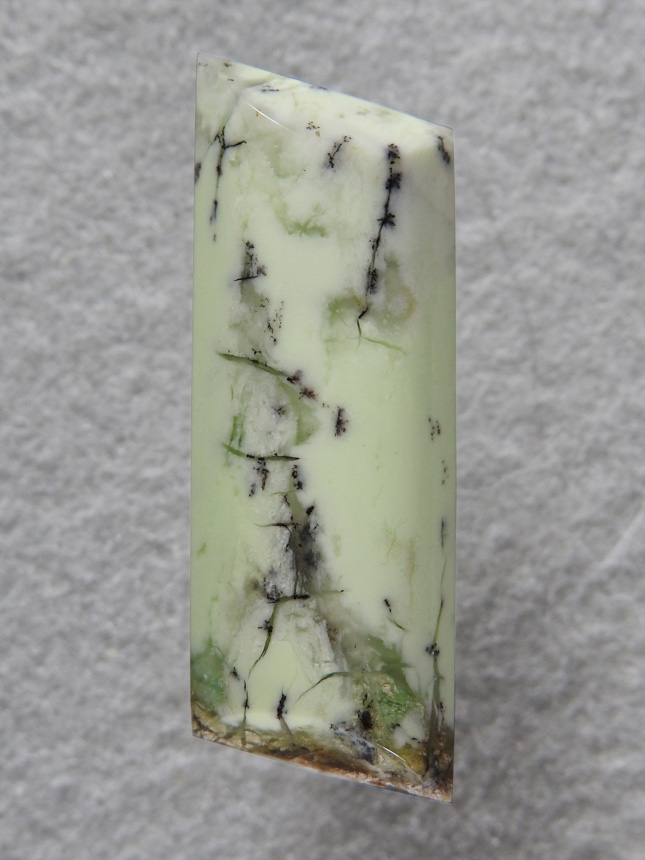 Citron Chrysoprase 563  :  Gorgeous cab in lime.  The pastel of Citron Chrysoprase is fantastic.  Harder to come by now but cuts very nice.