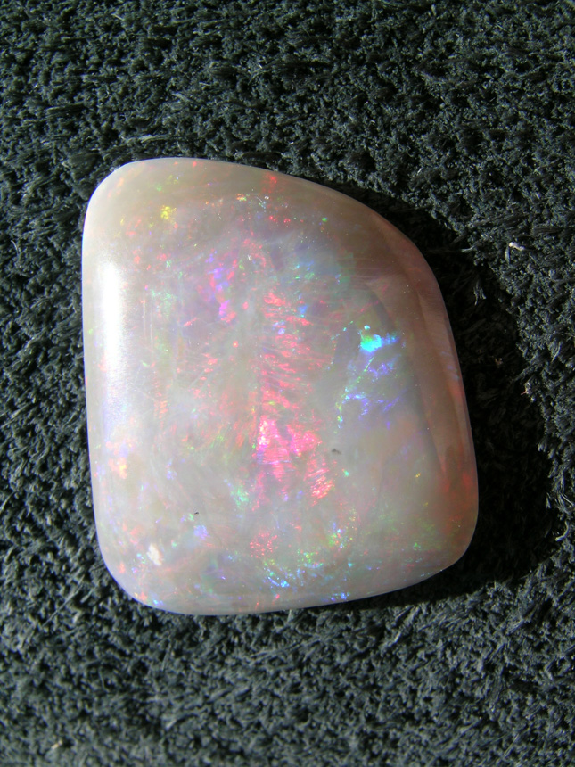 Fire Opal 511  :  One of several stones I got out of a $50.00 chunk of Opal