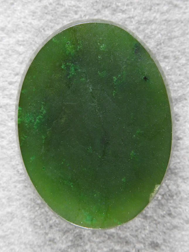 Jade 1740 : A large shallow dome cab of an unknown Jade.