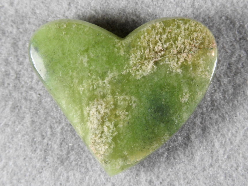 Jade 1741 : A very light colored Jade heart with some inclusions.