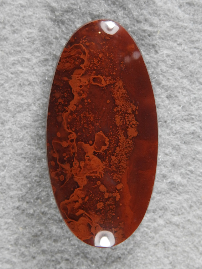 Pigeon Blood Agate 1970 : This material is so gemmy. The material takes a glass polish. A perfect oval of the red on red.