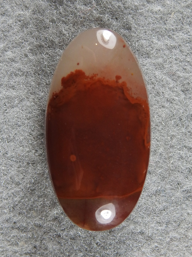Pigeon Blood Agate 1973 : This material is so gemmy. The material takes a glass polish. Great depth in this red on red cab.