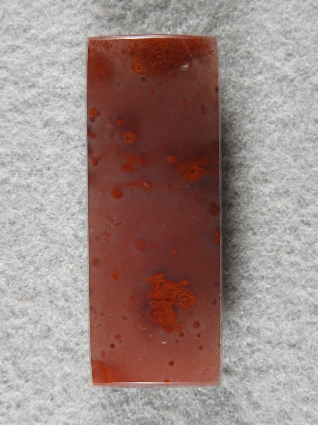 Pigeon Blood Agate 1975 : This material is so gemmy. The material takes a glass polish. Classic Pigeon material clear with spots.