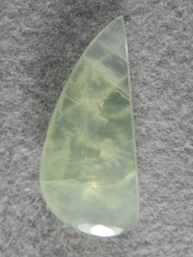 Prehenite 1842 : a Preheniote cab that is a bit Gemmier and very translucent.