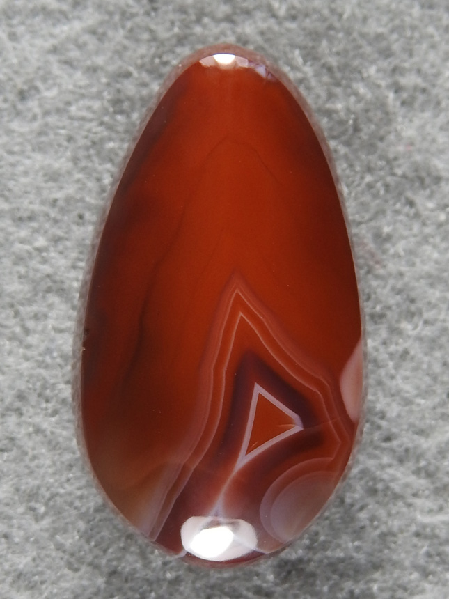 Queensland Agate 1720  :  Almost solid Cherry Red this cab sings. Gloss finish as usual with this material.
