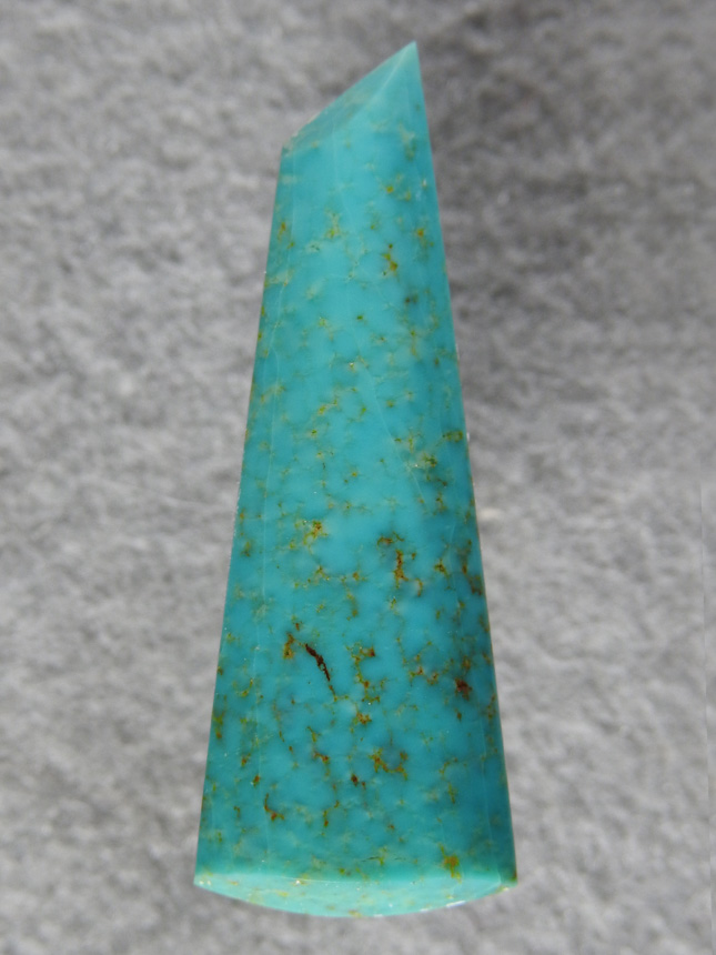 Turquoise 502  :  a sweet little cab of Turquoise.  Not sure if it was stabalized or natural.