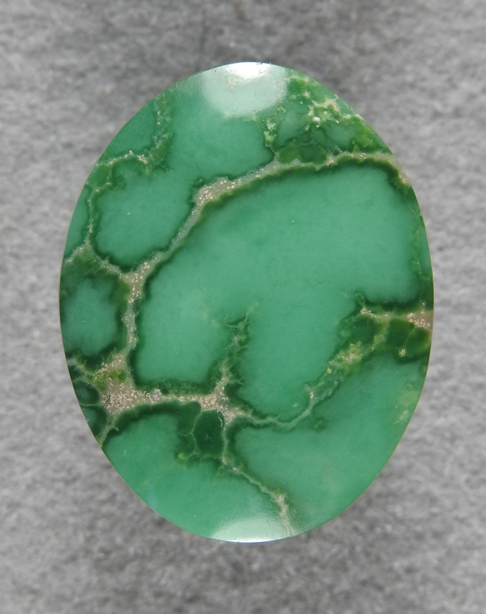 Varascite 2029  :  A Silky Green cab of webbed Varascite.  A beautiul stone.