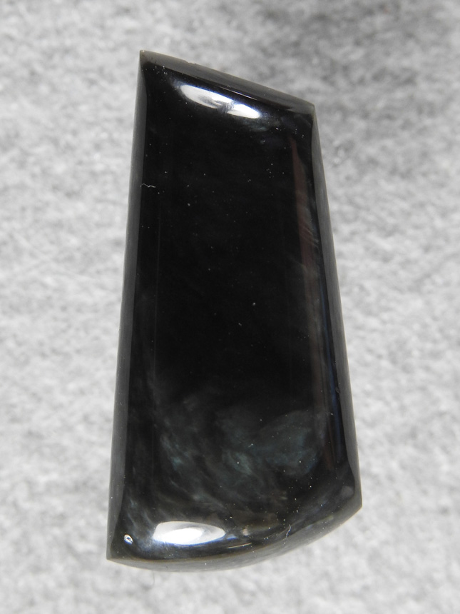 Velvet Obsidian 504  :  Some rough I purchased long ago this material multiple interlaced colors depending on the angle you view it from.