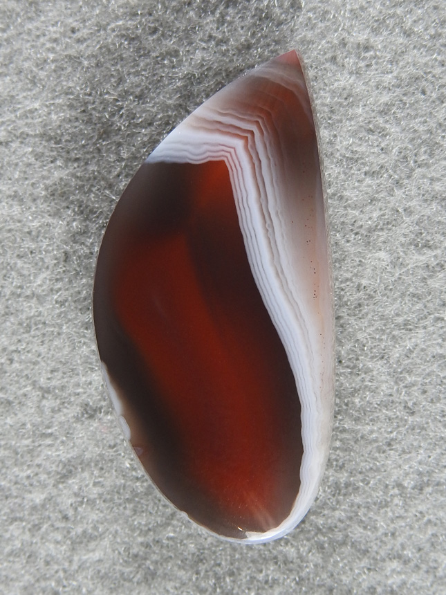 Botswana Agate 1761 : I just love Botswanas when they have the plum or reds inside.  Strong pattern and would make a nice earring to go with 1760.