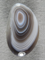 Botswana Agate 1937 : Very strong radiating lines in this sweet cab.