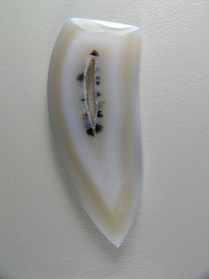 Brazilian Agate 570  :  This beatutiful and large cab came out of a large Brazilian slab 1 of 5 slabs I received.  The Dendrites surrounding the Druzy center make this a collector piece.