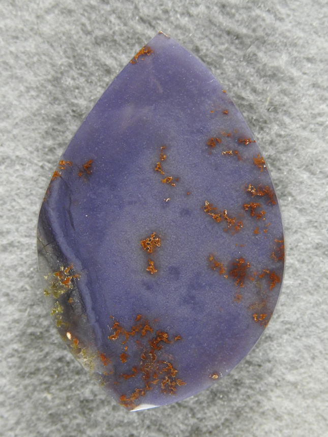 Burro Creek Jasper 1942  :  We dug out 200 lbs of dark Purple Jasper with Gold stringers. The mine has expanded (2017) and this pocket is now gone.