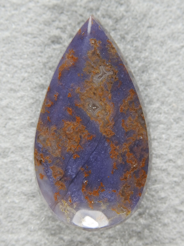 Burro Creek Jasper 1943  :  We dug out 200 lbs of dark Purple Jasper with Gold stringers. The mine has expanded (2017) and this pocket is now gone.