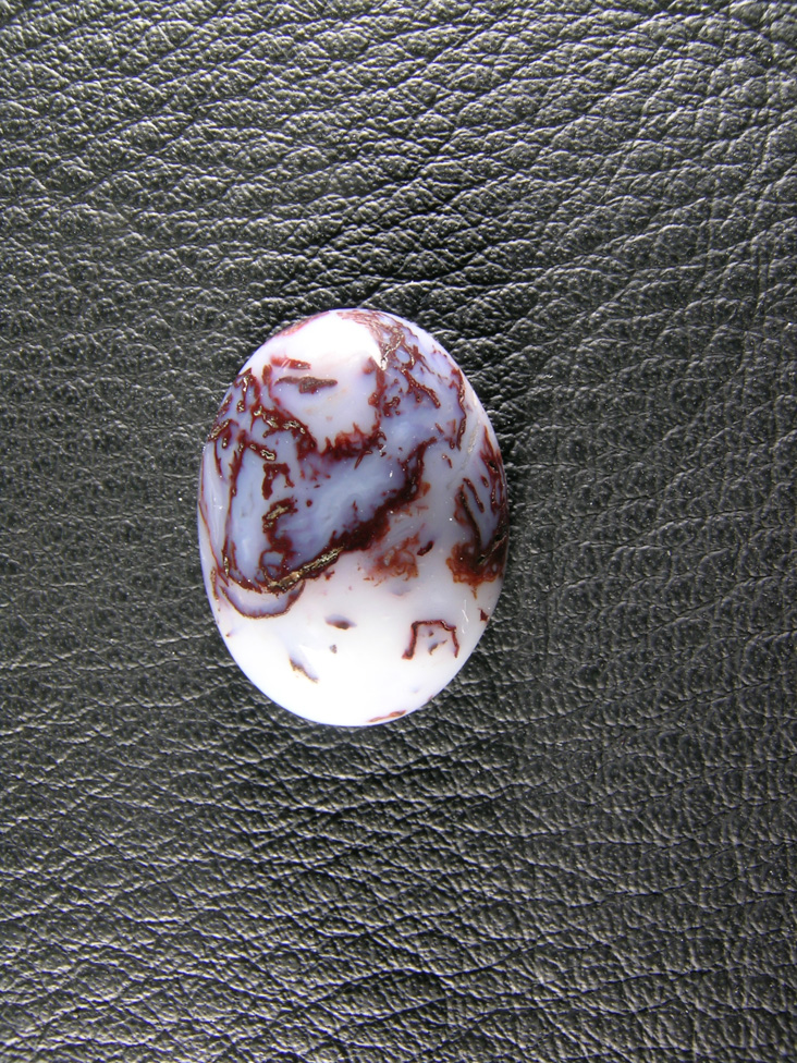 Cady Mtns Agate 585  :  A small cab of Milky White Agate and Red Moss running thru Central South Cady Mtns.