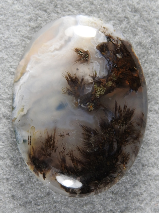 Calico Sagenite Agate 1790 : I love collecting in the Calicos for Sagenite.  Such a tough drive to the collecting area but such a nice stone. Needles against the white pillows is fantastic