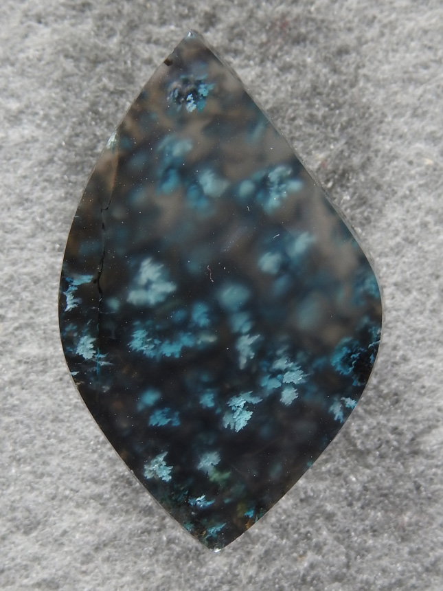 Chrysocolla plume agate 2084  :  I have so far only discovered a narrow seam of this material.   A real nice cab here.  What great depth and colors.