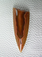 Traded Condor Agate 640  :  Another Acorn shape, this stone has great depth down in the Red inside the Orange band.