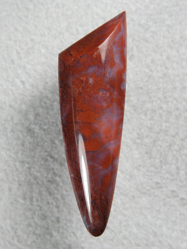 Coronary Plume Agate 647  :  Soft base and sharp top work well of the cut.  The Plumes make a nice color change and Blues in the base.