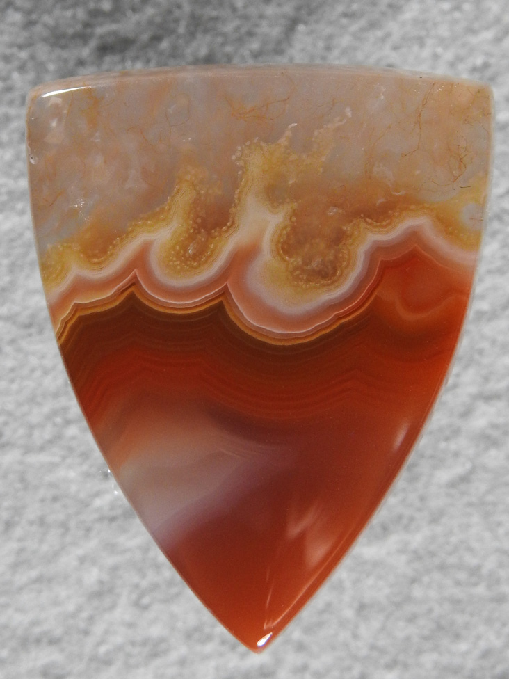 Coyamito Agate 148  :  Almost looks like flames between the Agate and the Quartz and those Golden Whisps, stunning.