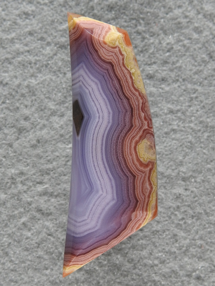 Coyamito Agate 177 : A pretty cab that includes a huge range a colors.  How would you like to be picking these up from the dirt.