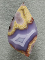 Coyamito Agate 166  :  Yellow and Purple are one of the most sought after color combos here.  This is a beautiful example here.