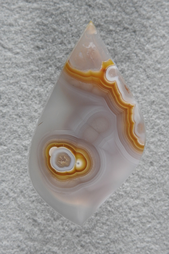 Coyamito Agate 218  :  Another excellent example of this Gold and Clear Tube Agate from Coyamito.  A glassy finish and on it's side reminds me of a small bird with the tube being the eye.