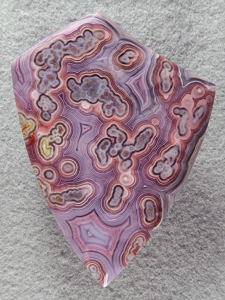 Coyamito Agate 220  :    Look at this color and these patterns with fortifications, shadows, tubes etc.  This chunk of Coyamito was expensive but wow what one of a kind collector cabs.