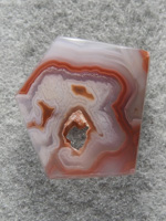 Coyamito Agate 1472 : A cross section of an aragonite pseudomorph.  Cut the geometric to follow the lines.