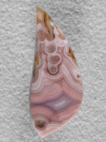 Coyamito Agate 203  :  I was given 4 slabs of this exotic color Coyamito to cut and the patterns and tubes combined with the Pink and Brown colors to make some striking cabs. Amazing Shadow Agate too.