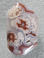 Coyamito agate 204  :  A tall and large cab of exceptional Psuedomorph Agate from Coyamito.  A wonderful color combo and intense Reds make this a beautiful cab.