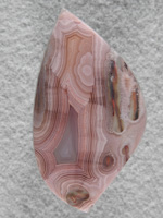 Coyamito Agate 205  :  I was given 4 slabs of this exotic color Coyamito to cut and the patterns and tubes combined with the Pink and Brown colors to make some striking cabs. Amazing Shadow Agate too.