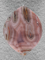 Coyamito Agate 206  :  I was given 4 slabs of this exotic color Coyamito to cut and the patterns and tubes combined with the Pink and Brown colors to make some striking cabs. Amazing Shadow Agate too.