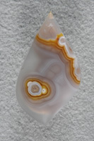 Coyamito Agate 218  :  Another excellent example of this Gold and Clear Tube Agate from Coyamito.  A glassy finish and on it's side reminds me of a small bird with the tube being the eye.