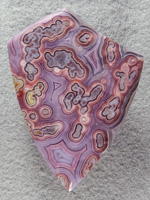 Coyamito Agate 220  :    Look at this color and these patterns with fortifications, shadows, tubes etc.  This chunk of Coyamito was expensive but wow what one of a kind collector cabs.