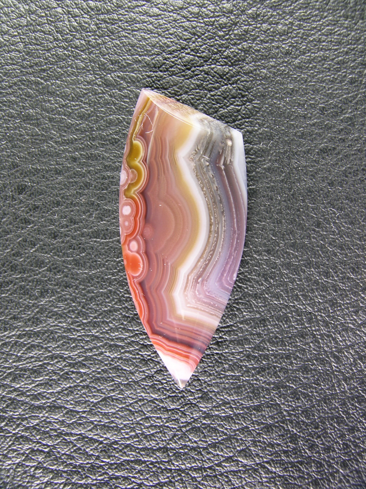 traded Coyamito Agate 237T  :  I cut this piece to try and keep those lovely multi colored orbs on the left side of the stone.
