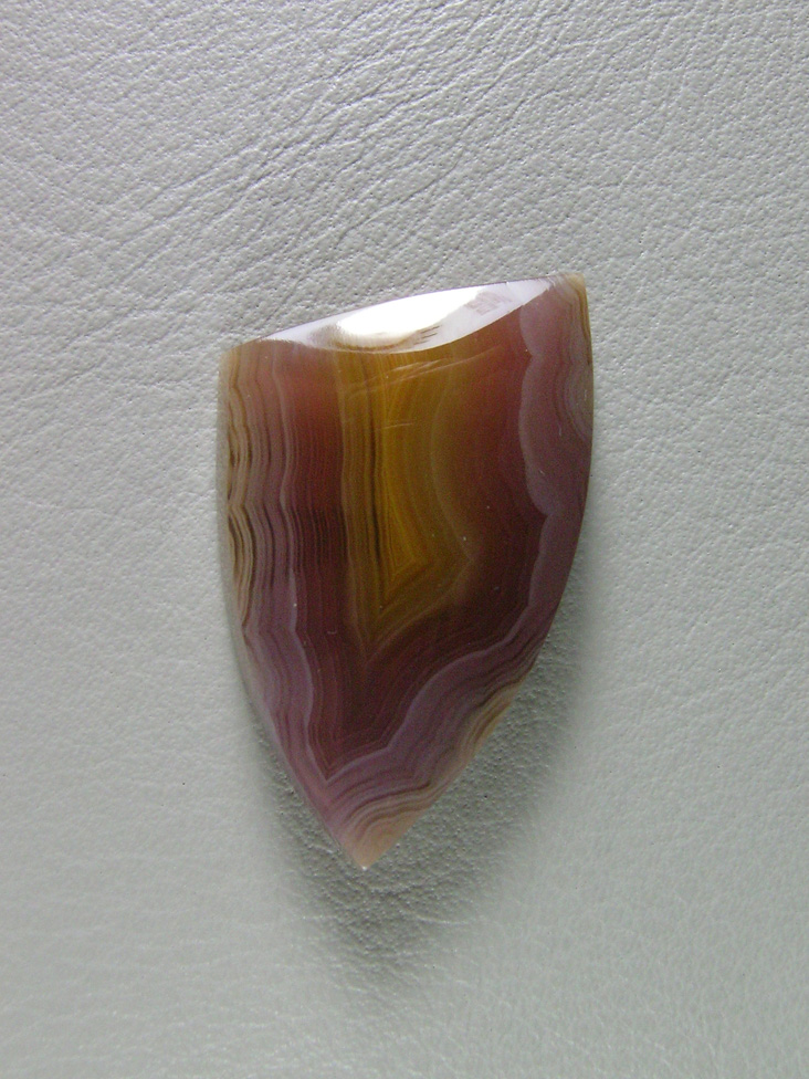 traded Coyamito Agate 257T  :  I have cut around 5 of these pieces from the same stone.  A very pleasing little gemmy cab and perfect polish.