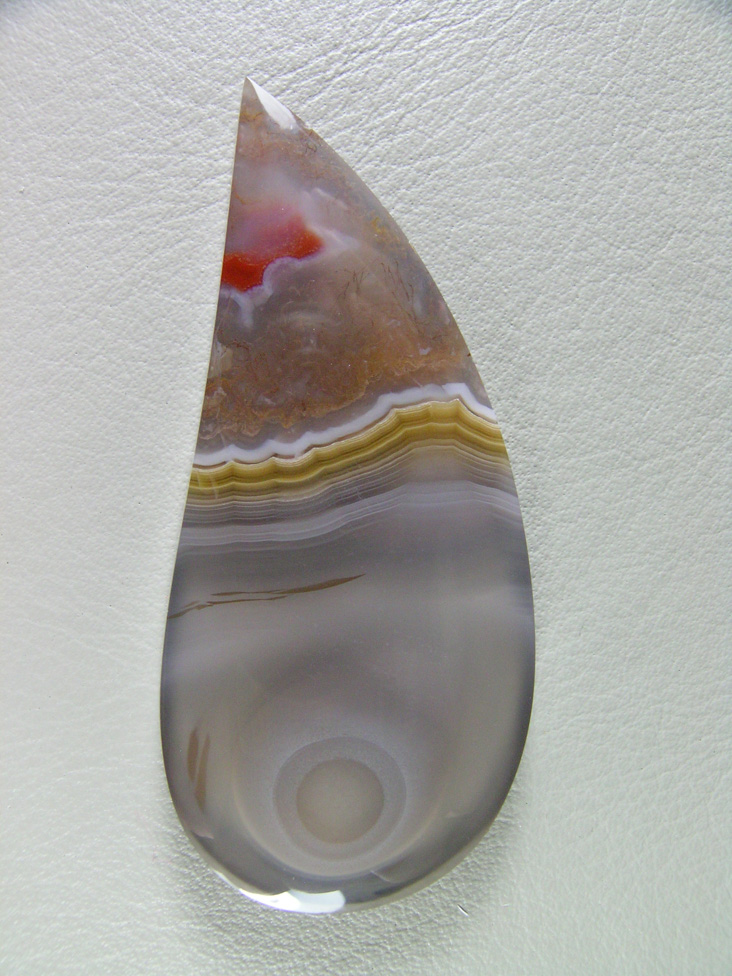 traded Coyamito Agate 260T  :  Another excellent example of this Gold and Clear Tube Agate from Coyamito. This stone has a unique White Eye coming up thru the Clear.