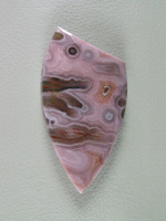 traded Coyamito Agate 244T  :  I was given 4 slabs of this exotic color Coyamito to cut and the patterns and tubes combined with the Pink and Brown colors to make some striking cabs.