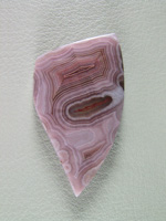 traded Coyamito Agate 245T  :  I was given 4 slabs of this exotic color Coyamito to cut and the patterns and tubes combined with the Pink and Brown colors to make some striking cabs.