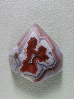 traded Coyamito Agate 254T  :  A cab of exceptional Psuedomorph Agate from Coyamito.  A wonderful color combo and intense Reds make this a beautiful cab.  Perfect for a pendant
