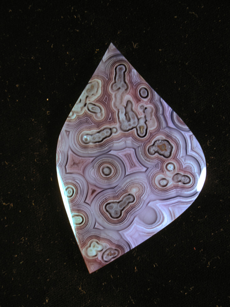 traded Coyamito Agate 287T  :      Look at this color and these patterns with fortifications, shadows, tubes etc.  This chunk of Coyamito was expensive but wow what one of a kind collector cabs.