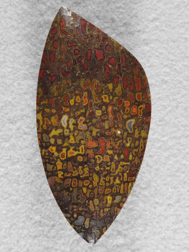 Dino Bone 385  : I only wish I had pounds of this color combo!  Striking is all I can say.  A collector stone.