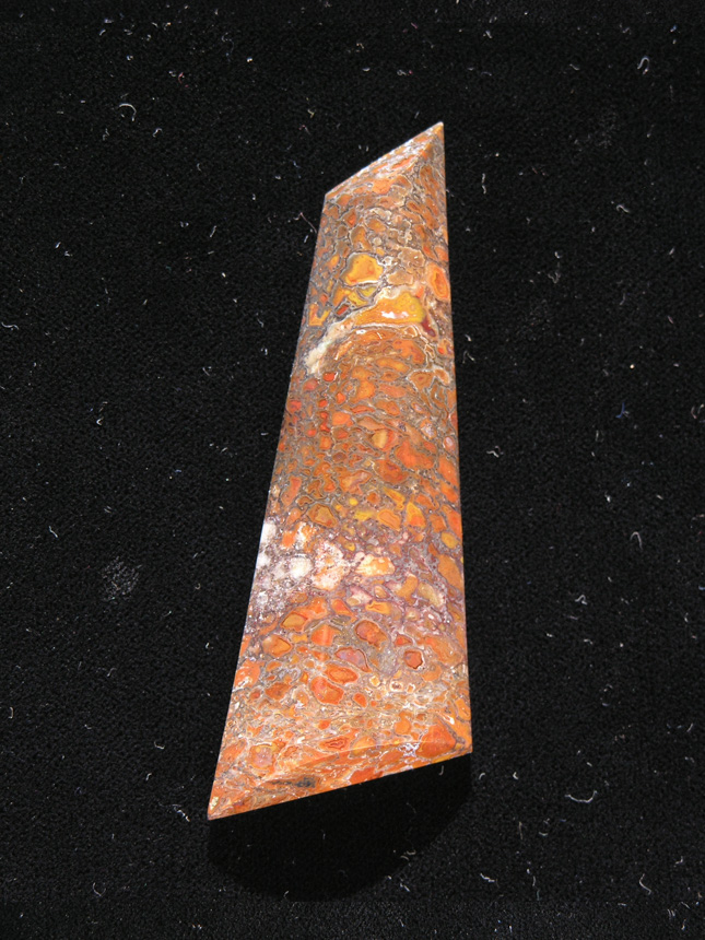 traded Dino Bone 391T  :  Photo'd on the fly in direct sun so the stone has a yellowish/orange hue.  Can't retake due to traded last year.