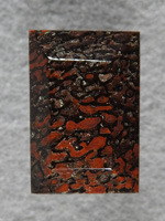 Dino Bone 1922 : A small stone for a ring in high contrast Red and Black.