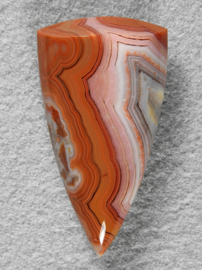 Dryhead Agate 423  :  A really great badge shape and the entire gamut of colors in a mirror polish.